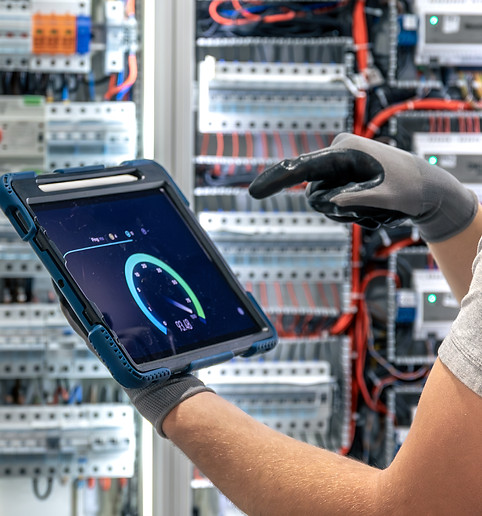 electrician-analyzing-data-tablet-use-digital-switchboard-control.jpg