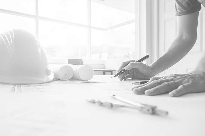 hands-of-engineer-working-on-blueprint-construction-concept-engineering-tools-vintage-tone