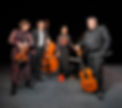 CHAMBER OBSCURA- group, all looking at Kieran, cropped.JPG