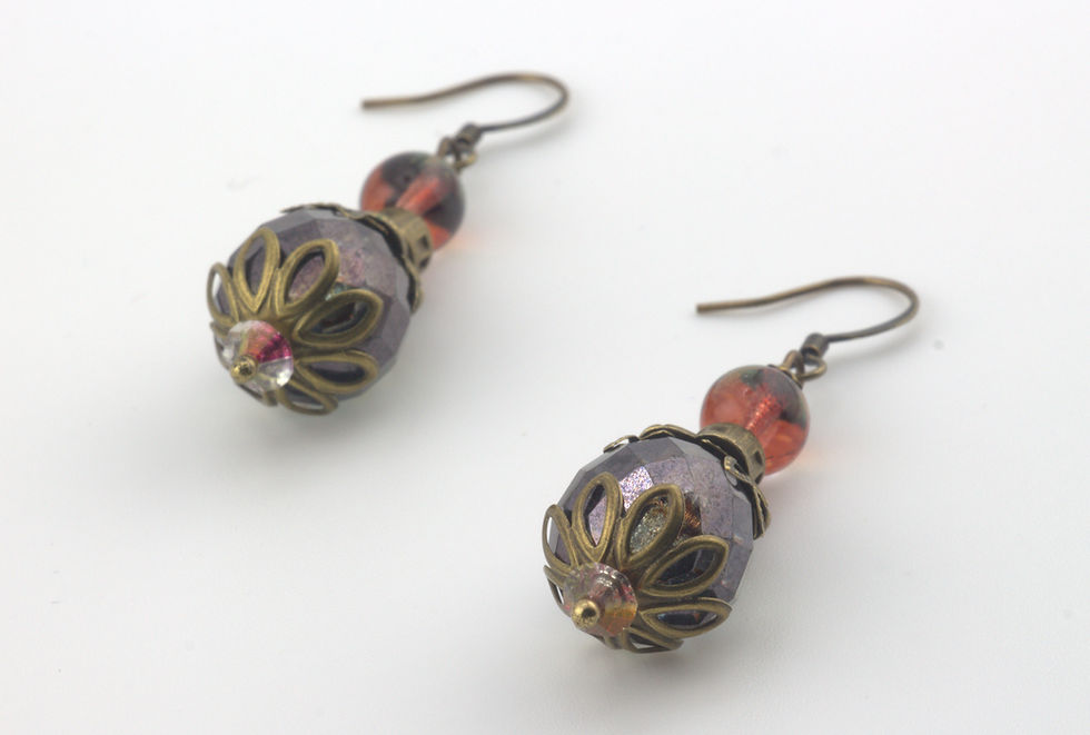 Thumbnail: Vintage Inspired Flower Drop Earrings - laying on flat surface