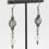 Thumbnail: Closer side view of earrings hanging from stand - Majestic Blue and Tortoise Shell Table Cut Earrings