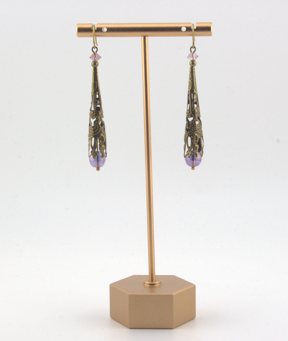 Tibetan Style Filigree Cone Earrings - on stand, full view