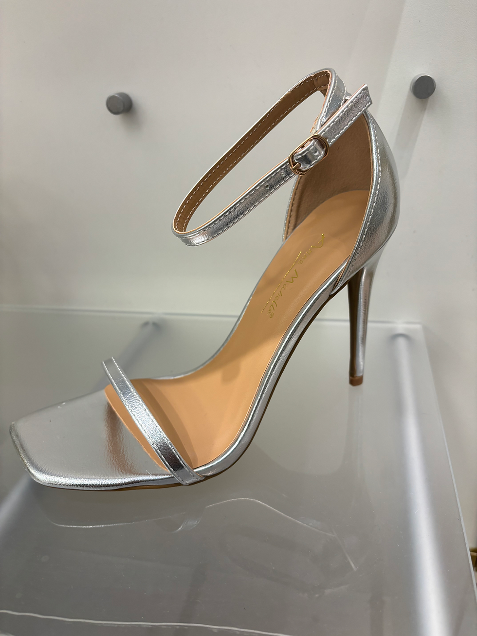 Silver high heel sandal. Elegant design for special occasions.