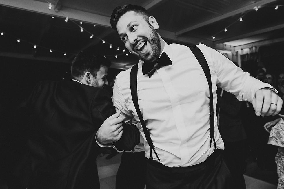 Evening wedding celebration at a Washington DC rooftop venue