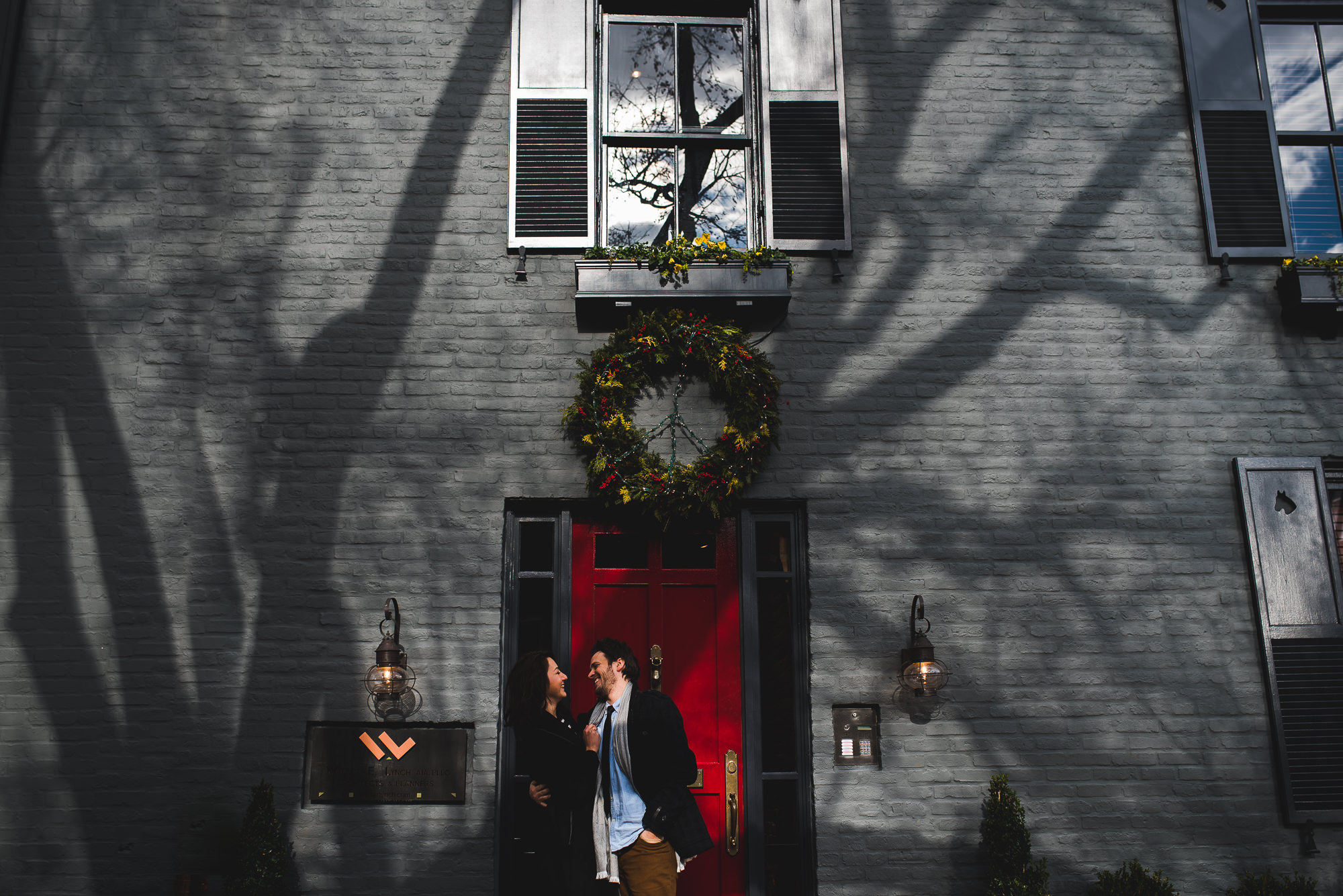 Martin and Mariela during their engagement session on a historic Georgetown street in Washington, DC.