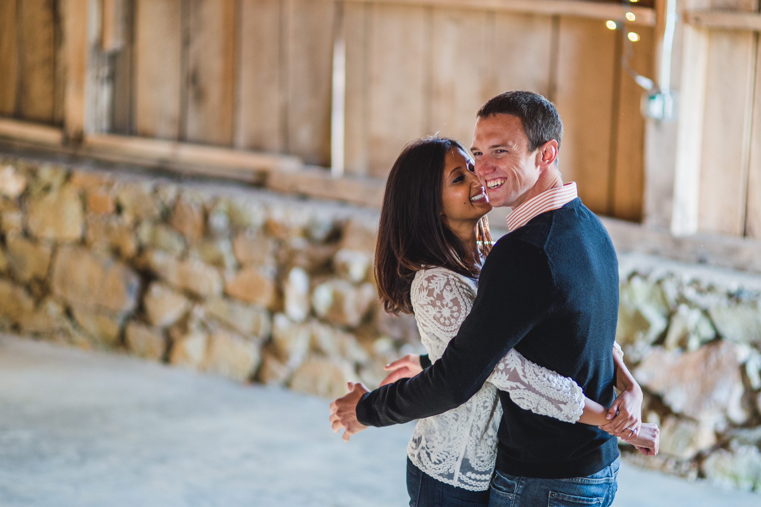 Engaged couple walking during a fall session in Old Town Alexandria, Virginia.