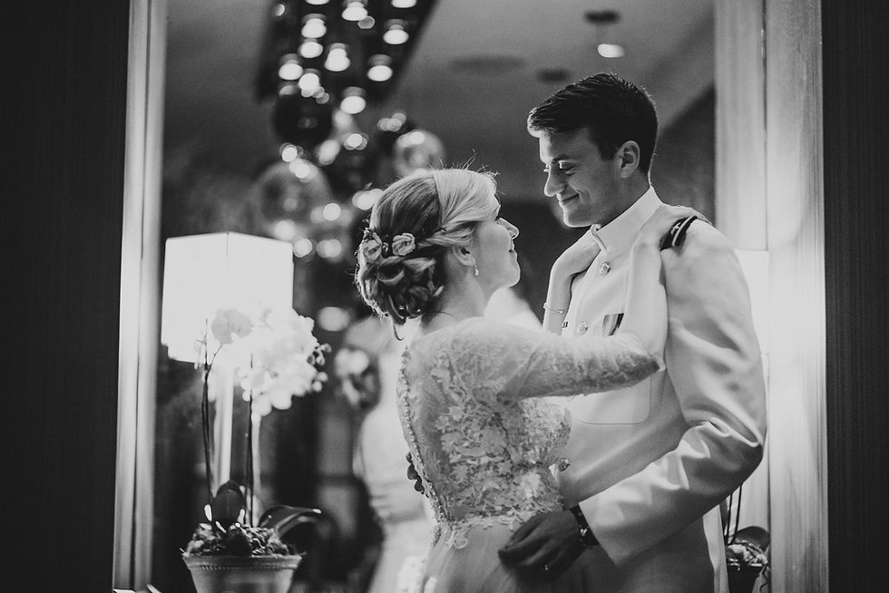 A couple dancing together at their reception