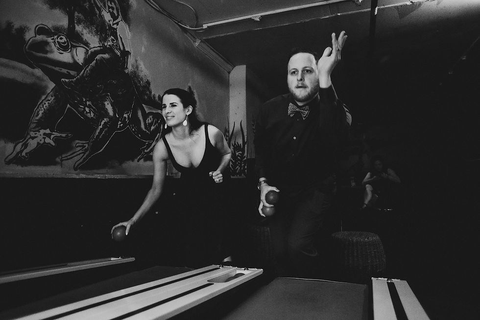 Woman dances while guests watch