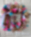 wreath boots.jpg Purple, pink, blue wreath, approx 24" round, sign with boots