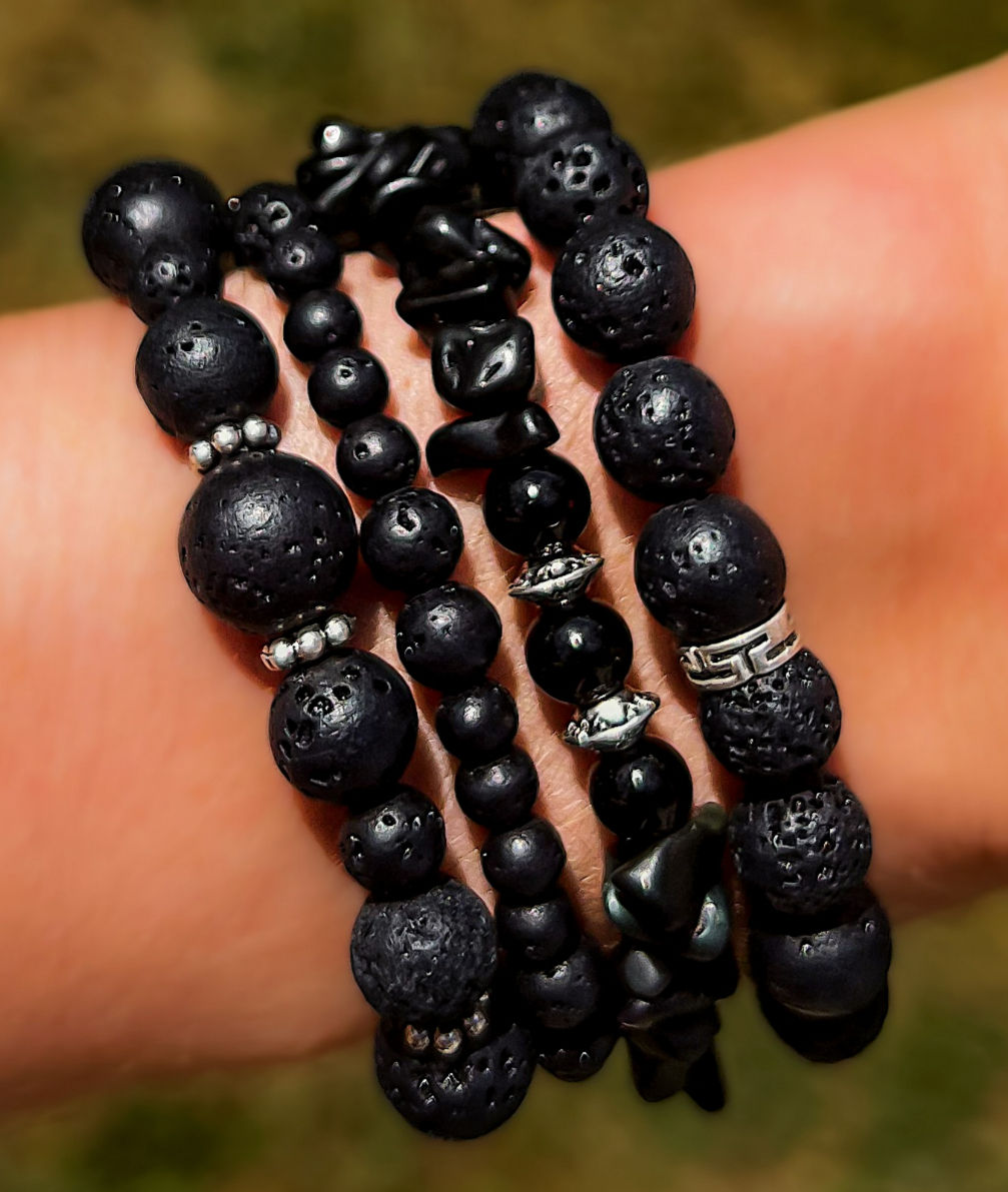 wear something...black bracelet set