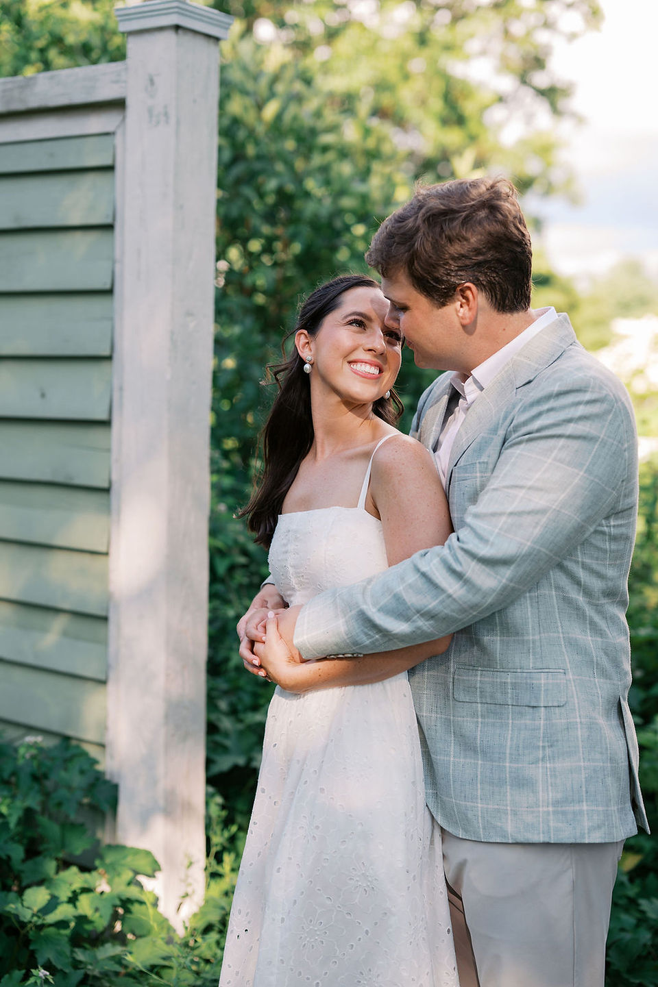 Emily May and Hudson laughing together during their classic Kentucky engagement session