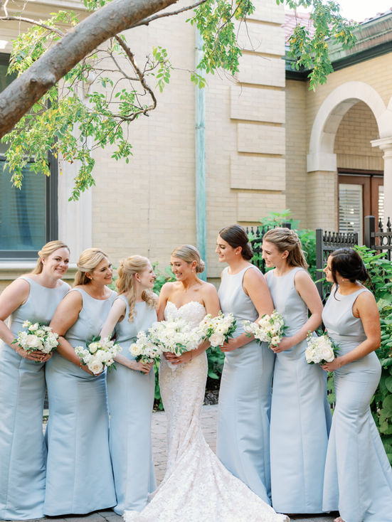 bride and bridesmaids posing with bouquets taken by Maria Gloer Photography nashville wedding photographer