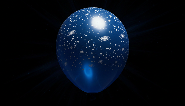 Close-up view of dots drawn on an inflating balloon to show cosmic expansion.