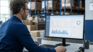 3PL client portal dashboard in a warehouse office