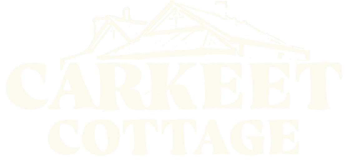 Carkeet Cottage Logo in cream on a dark green background