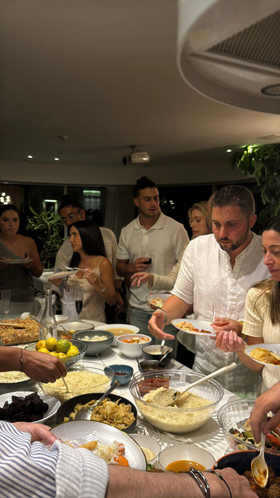 Group enjoying a delicious Shabat dinner