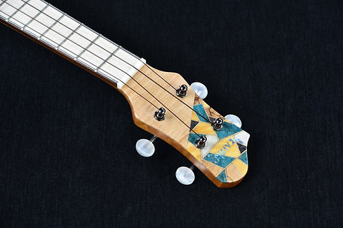 TK SPRUCE CURLY SAPELI HEAD.jpg