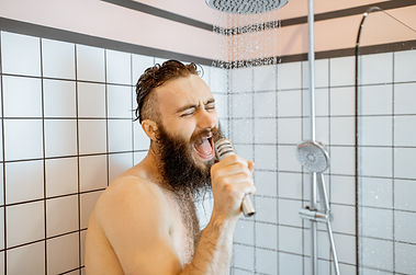 Canva - Man Singing in the Shower.jpg
