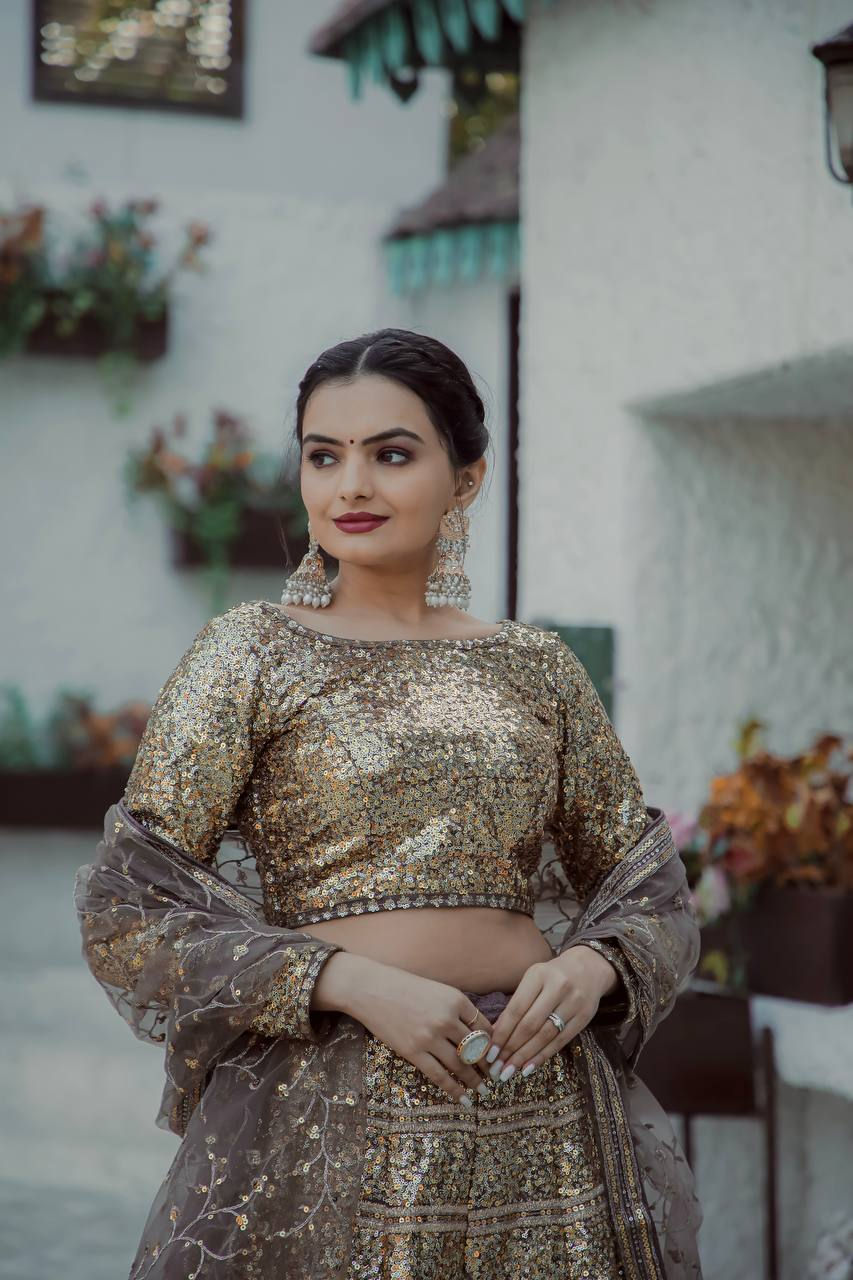 Thumbnail: Gold Colour Shimmering Faux Georgette Sequins Lehenga