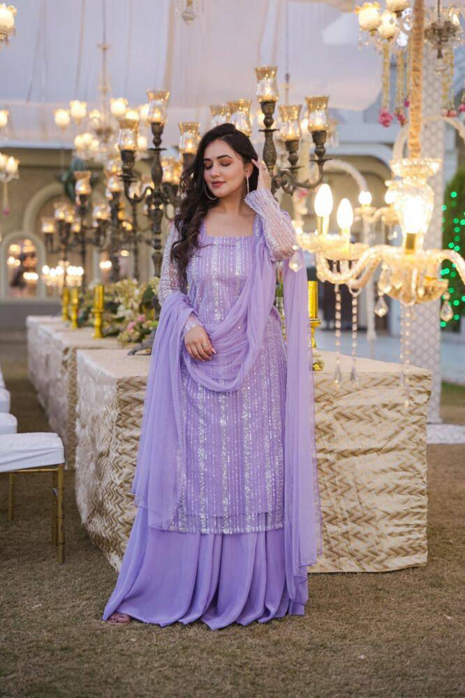 Thumbnail: Lavender Colour Heavy Faux Georgette With Sequence Work Sharara Suit