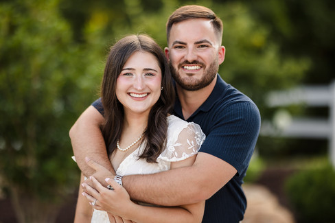 The Barn at Blue Sky Farm Engagement Photographs Couple embracing