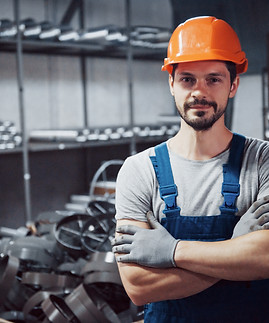 portrait-young-worker-hard-hat-large-metalworking-plant.jpg