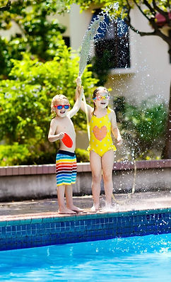 depositphotos_181366336-stock-photo-kids-play-with-water-hose_edited.jpg