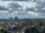 City skyline with cloudy sky