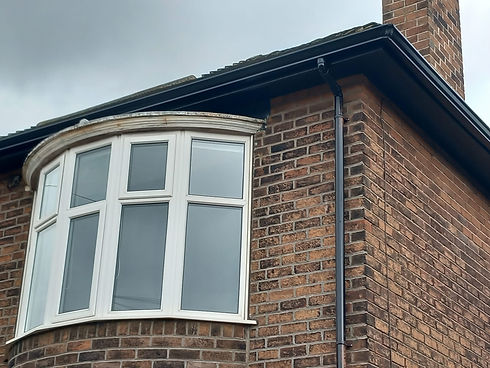 Residential property with well maintained guttering system fitted along the roofline
