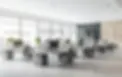 Spacious modern office with rows of desks and computers