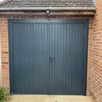 Metal garage door with handle