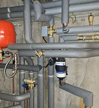 Detailed View of insulated pipework and pressure gauges