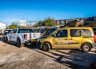 Probuild Facilities Management's fleet of vehicles parked up in their yard