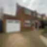 Brick house with garage door
