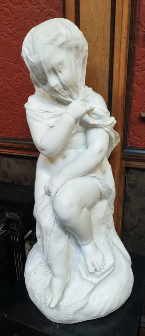 marble statue of a veiled child