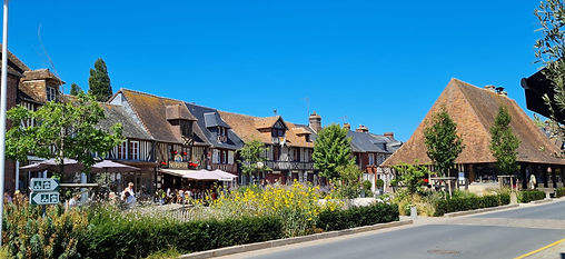 Beuvron-en-Auge village square with traditional half-timbered houses, a highlight of our Normandy Pays d’Auge private tour.