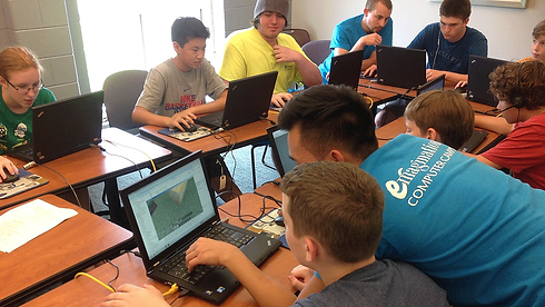 Camp counselors teaching Minecraft World Design at Emagination Tech Camp