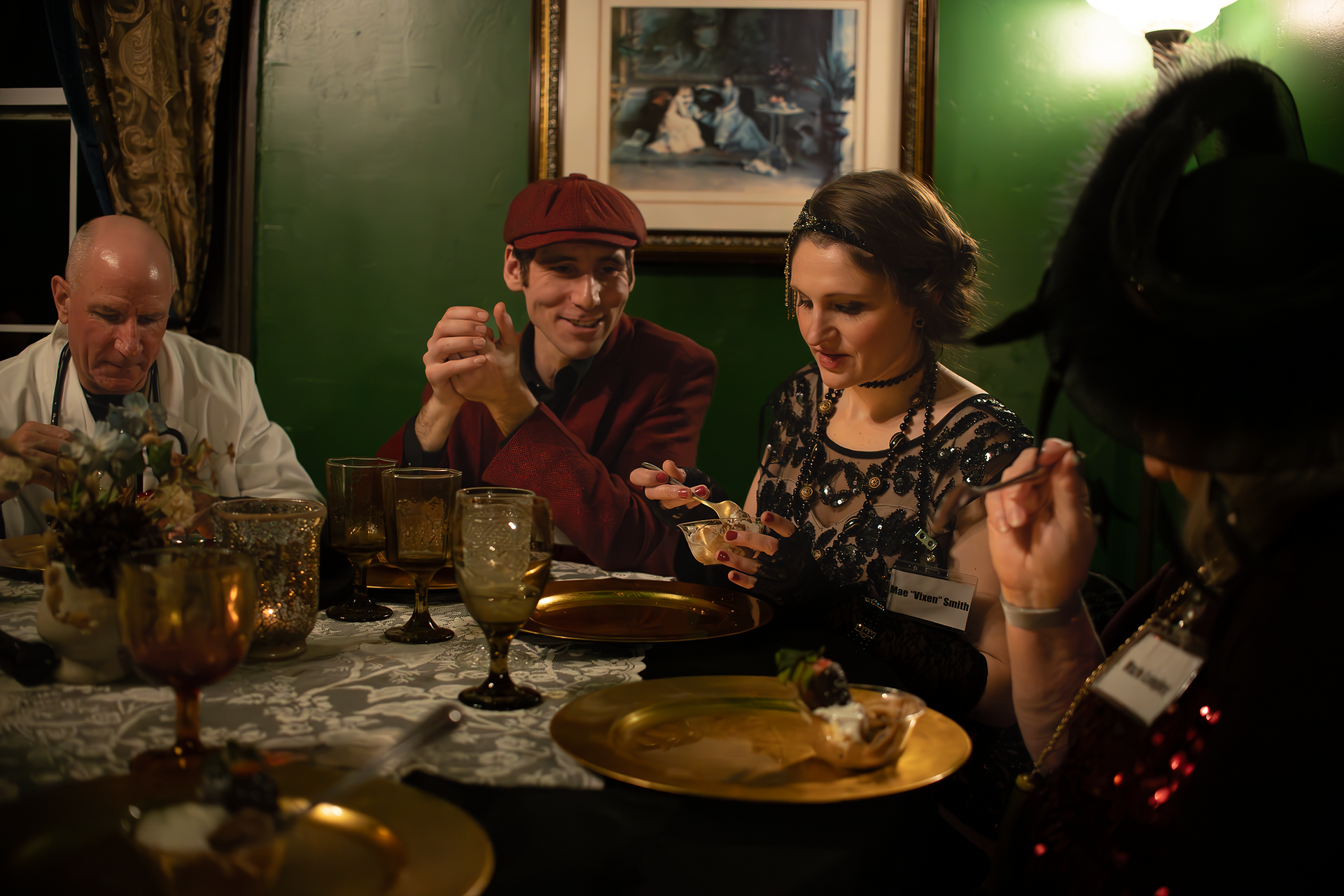 candid photo of dinner guests at Whistlestop Manor in Sweetwater, Tennessee, a murder mystery dinner