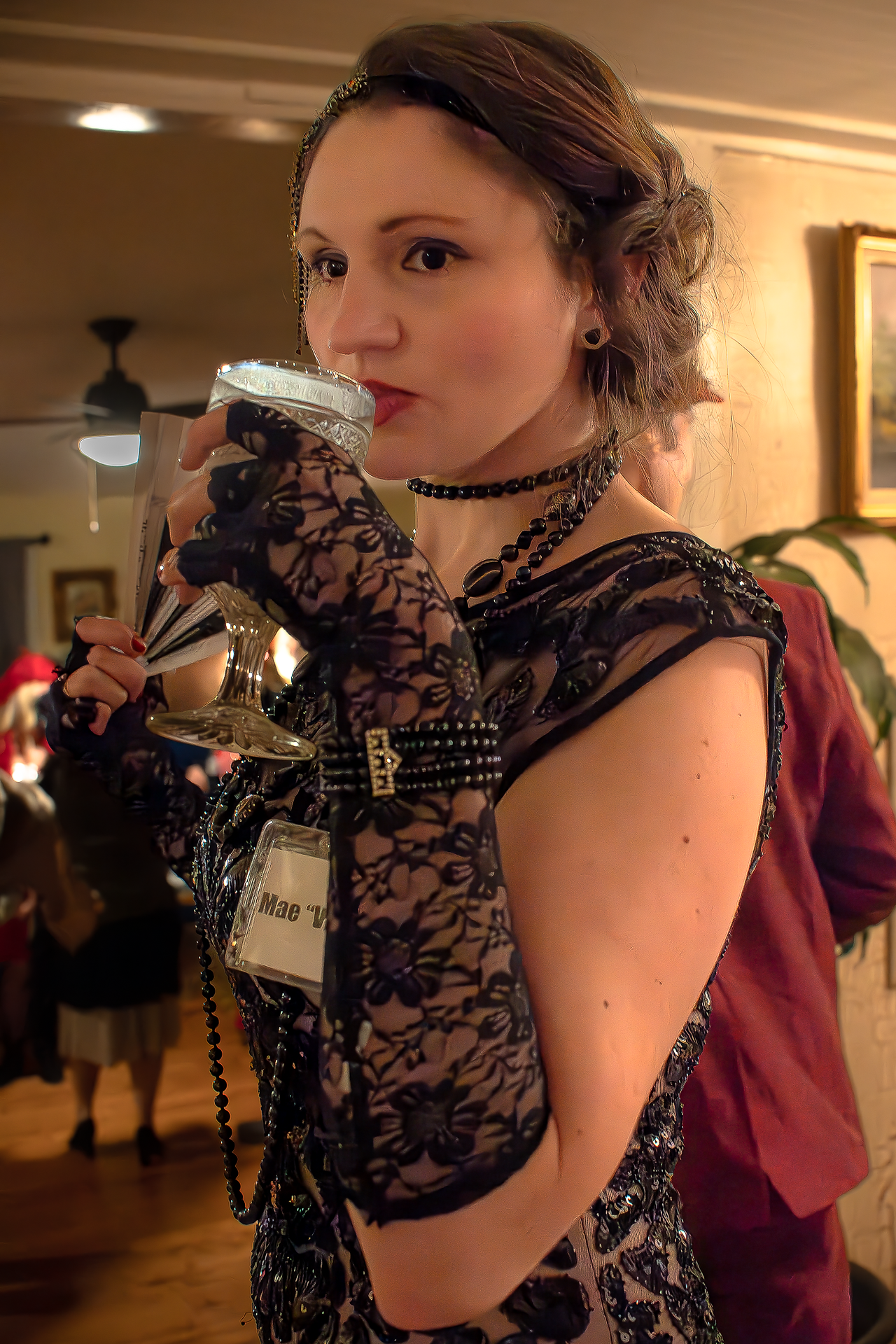 photo of guest taking a drink at Whistlestop Manor