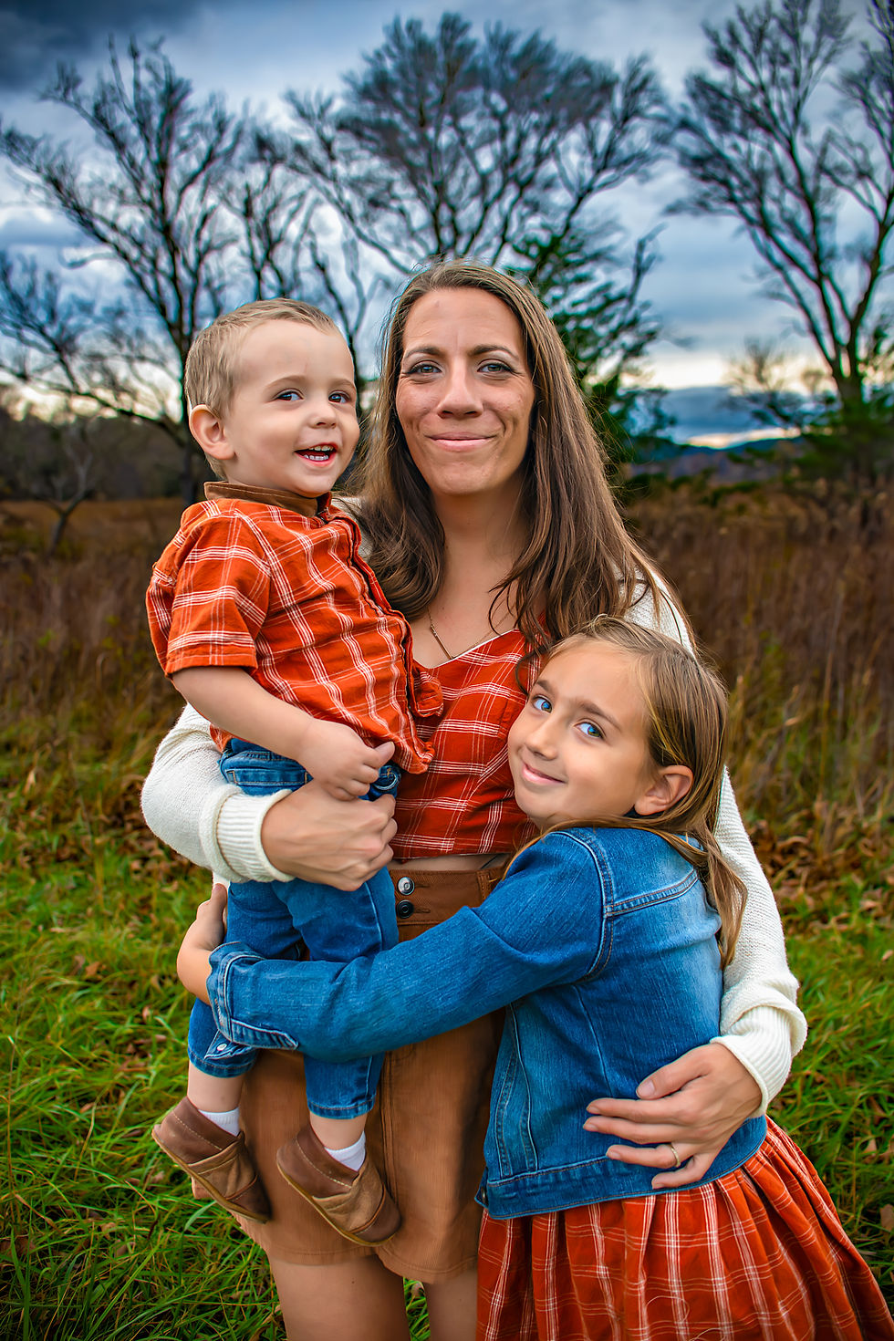 family photo at cades cove in autumn