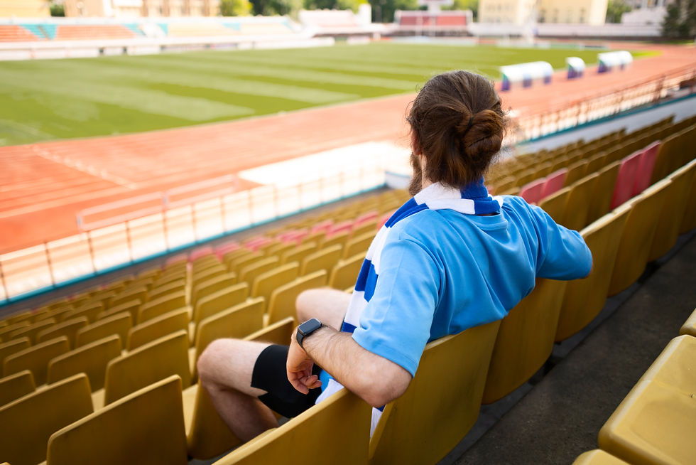 man-sitting-grandstands-side-view (1).jpg