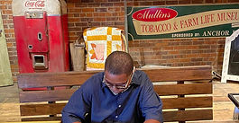 Autographing books at The South Carolina Tobacco Museum, Mullins, SC