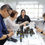 Thumbnail: Corporate team engaged in a perfume-making activity, selecting fragrance ingredients in a modern workshop.