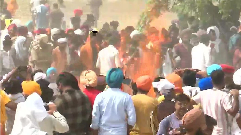 On the left, Sidhu Moose Wala's public cremation ceremony