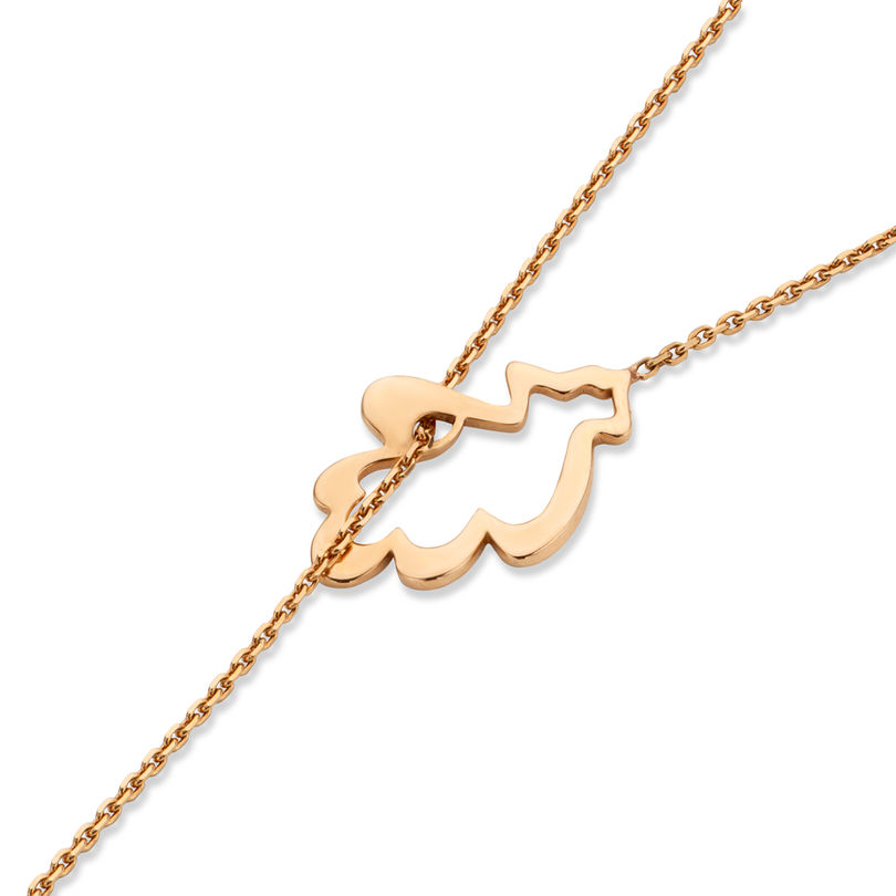 Close-up of openwork 18k gold oak leaf charm from necklace
