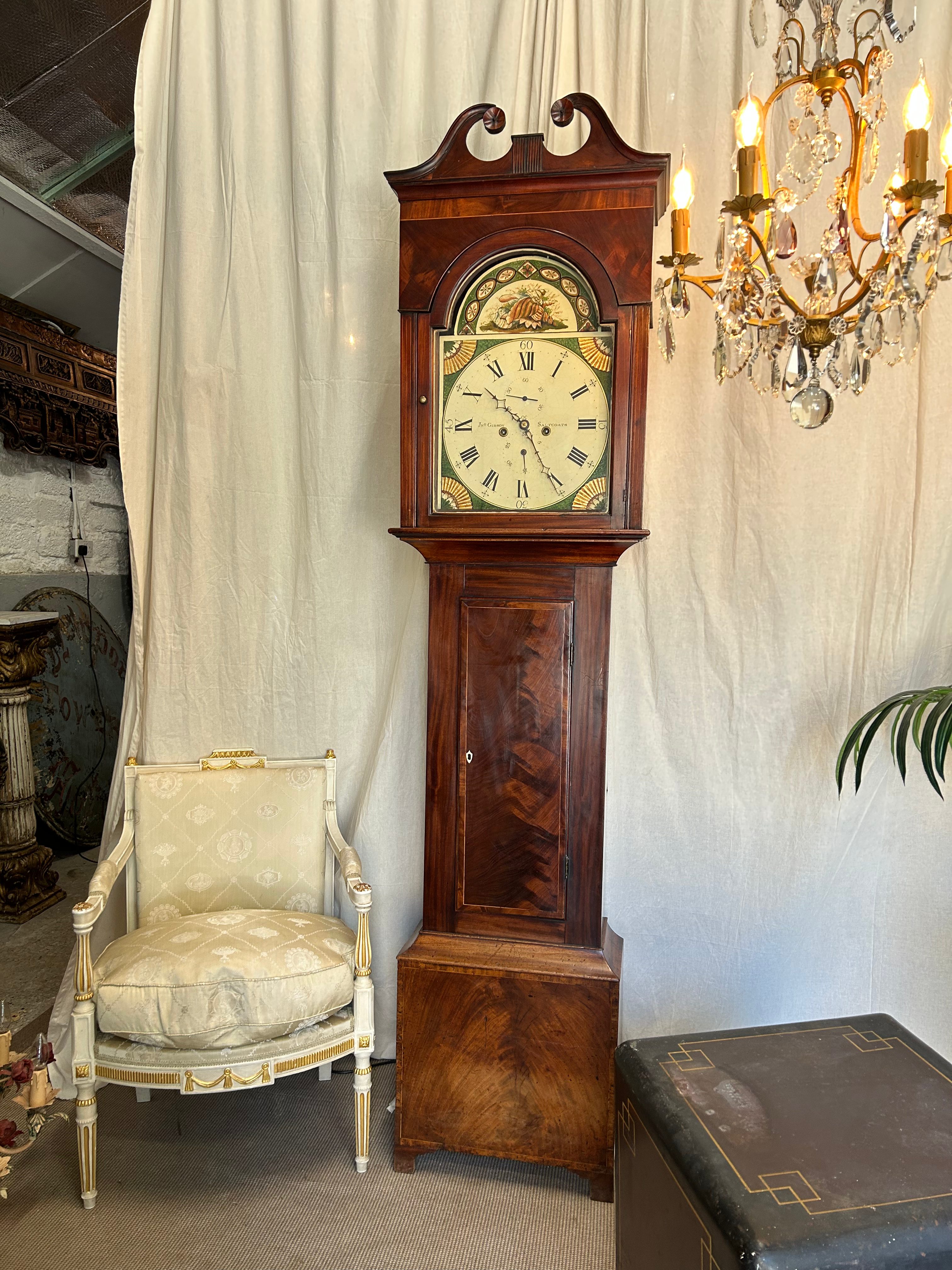 An 19th century flame mahogany eight-day longcase clock John Gibson, Saltc