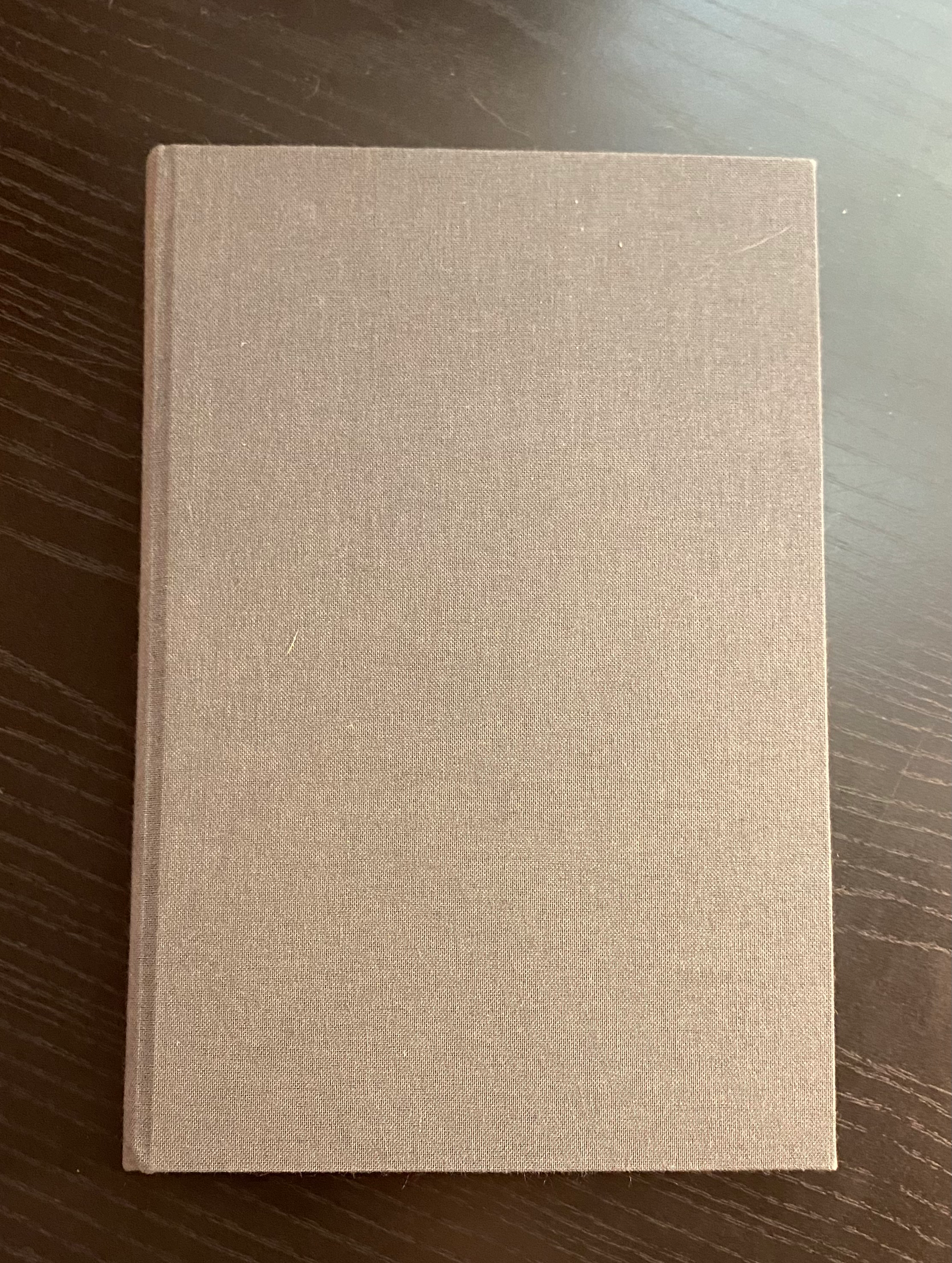 Gray case bound book, closed