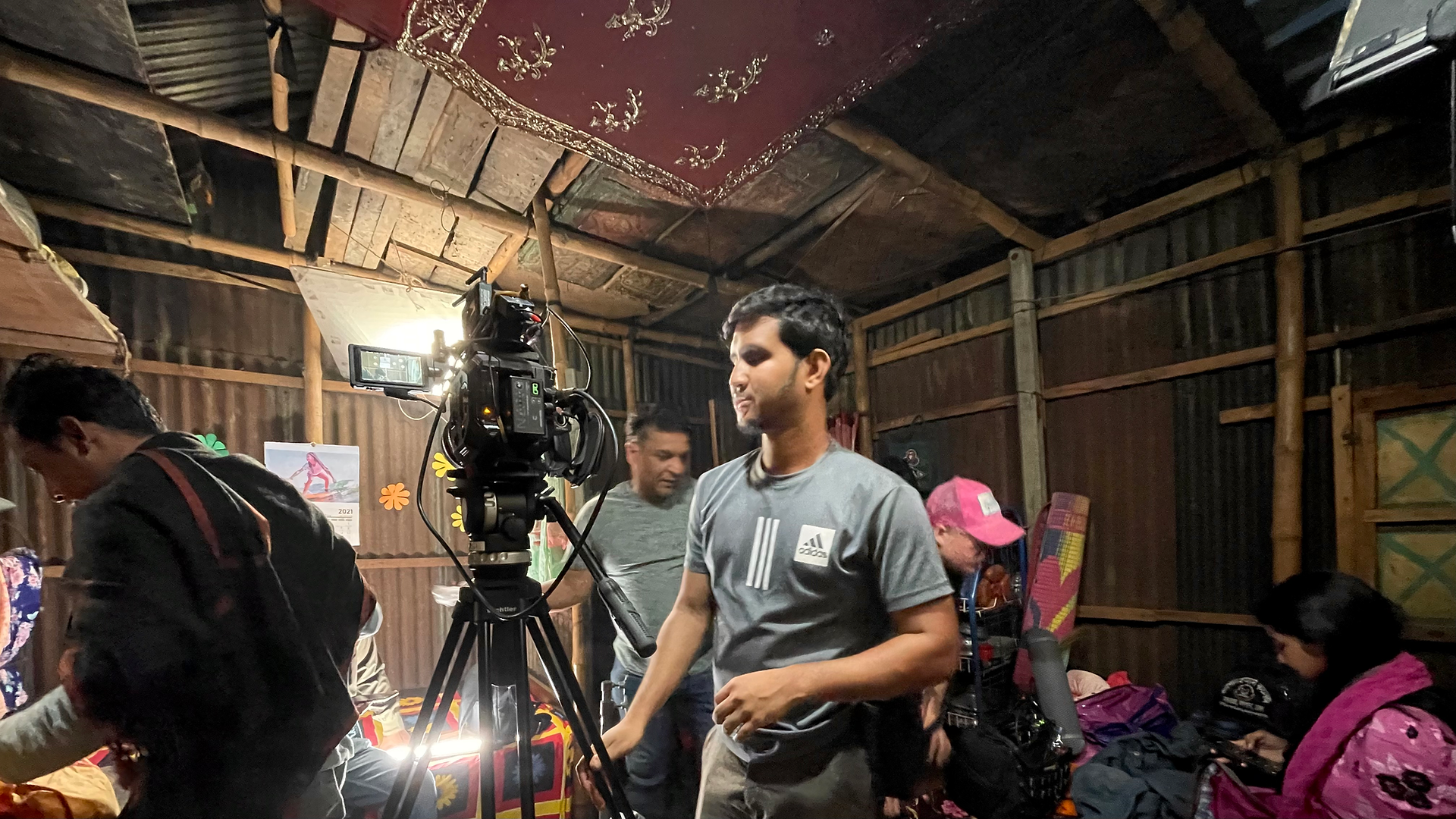 Setting up the shot inside a slum home. Image by cinematographer Nicklas Karpaty, FSF