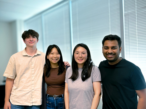 Two engineers and two sales team members in Neptec's office