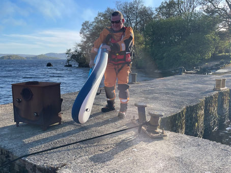 Paddle Boarders Blown